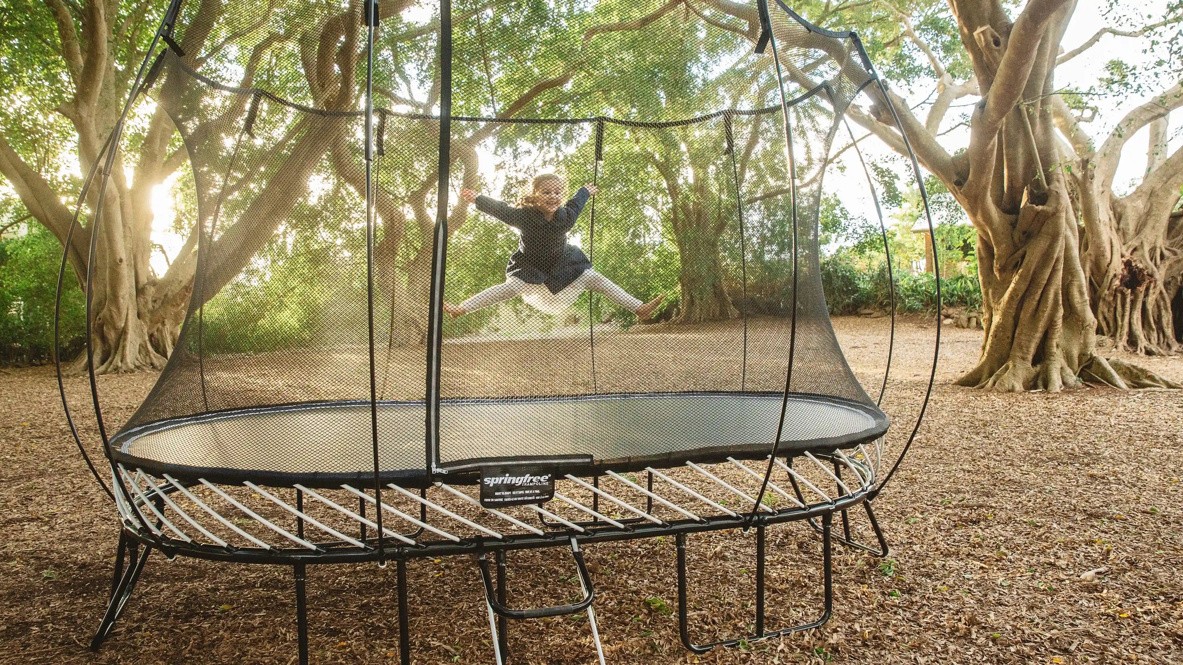 girl jumping on a trampoline
