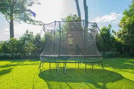 Load image into Gallery viewer, girl jumping on an outdoor trampoline