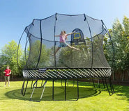 Load image into Gallery viewer, girl jumping very high on a trampoline