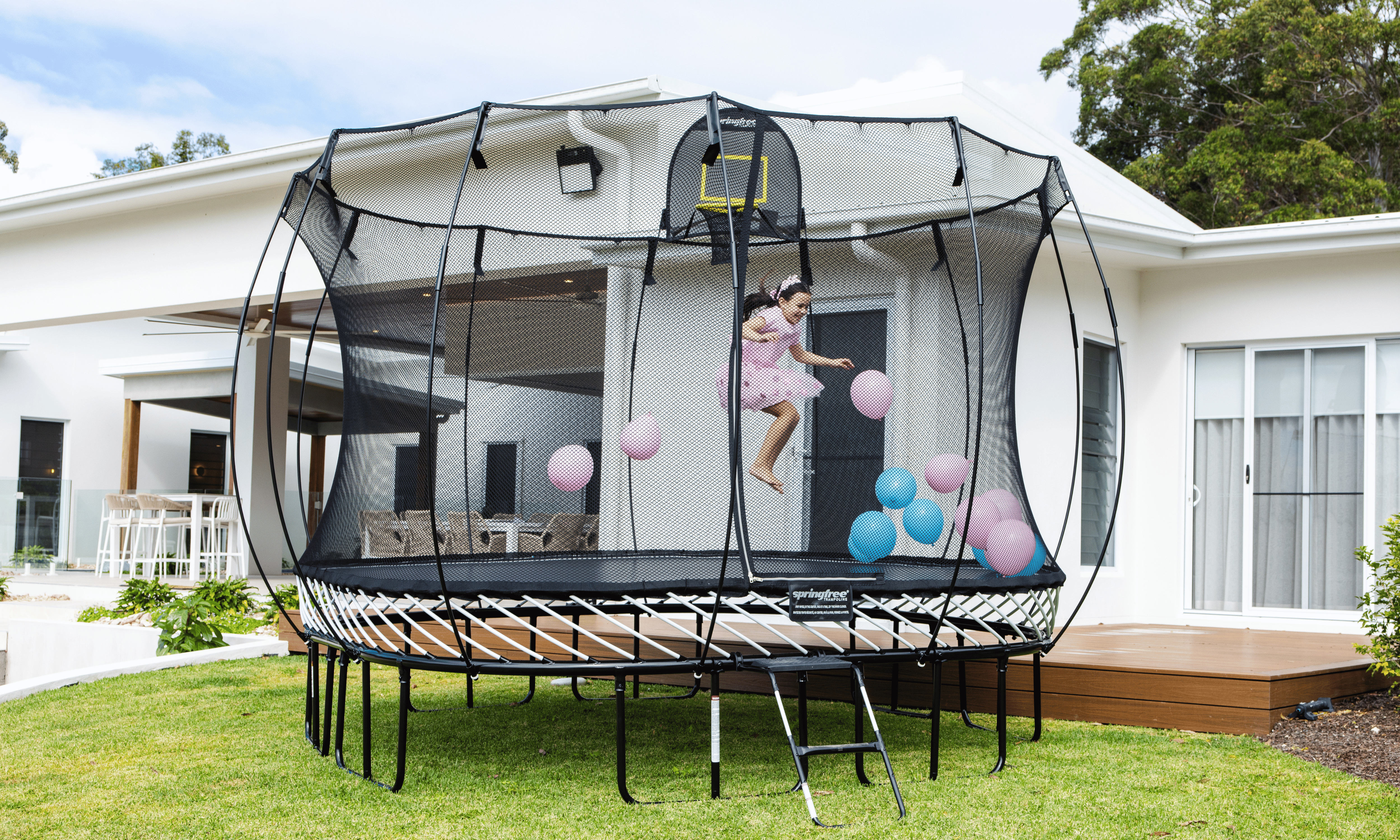 Trampoline vs Jumping Castle for Your Backyard