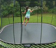 Load image into Gallery viewer, girl jumping on an outdoor trampoline
